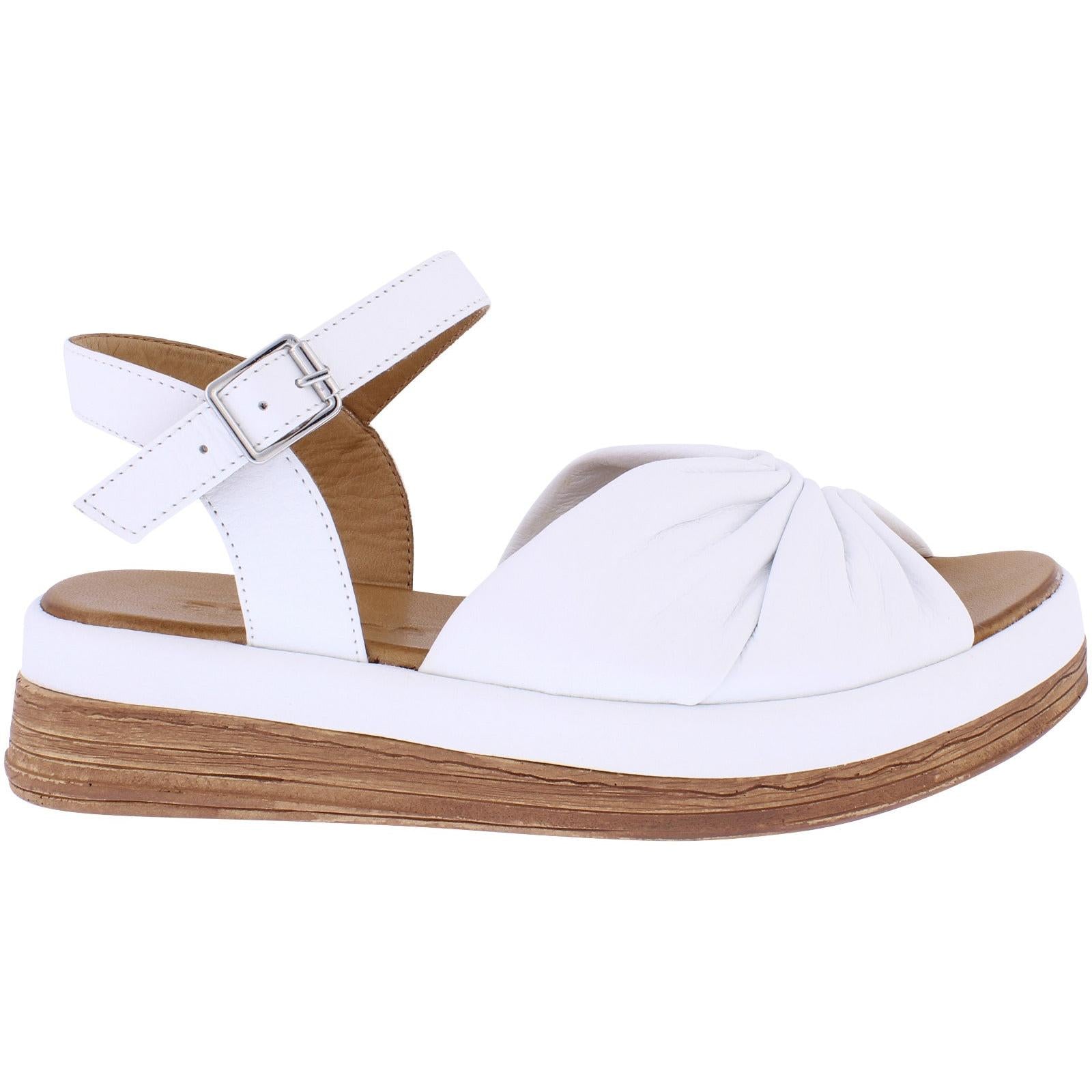 Adesso A7908 Italia women's white leather buckle sandals with twisted front strap and wooden platform sole.