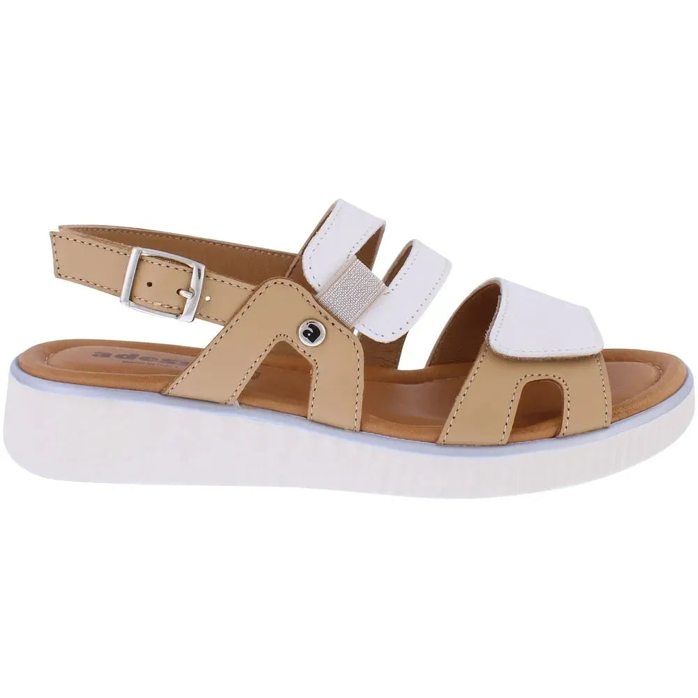 Adesso A8406 Tru Ladies Italian Leather Buckle Sandals with cream and tan straps, cushioned footbed, and white rubber sole.