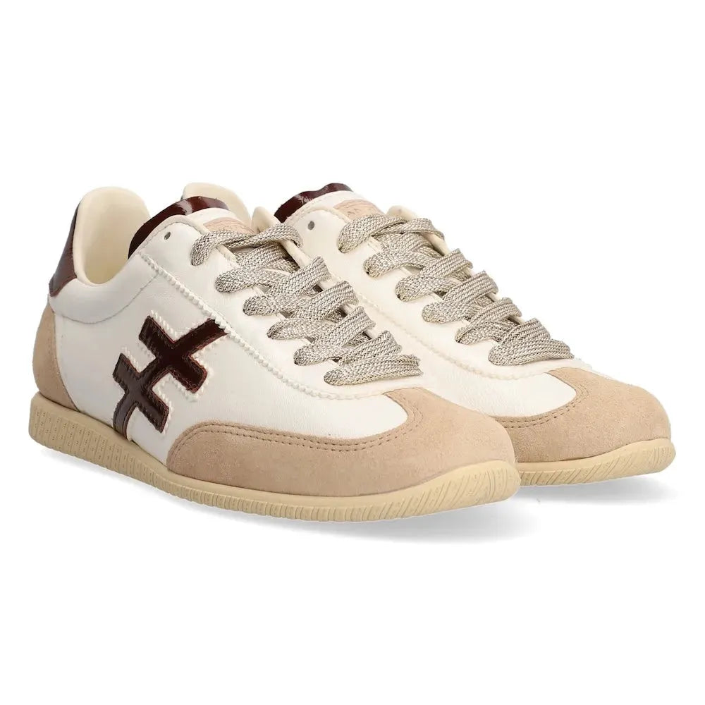 Women's Spanish multi-leather lace-up trainers, beige and white with dark cross logo, casual athletic style.