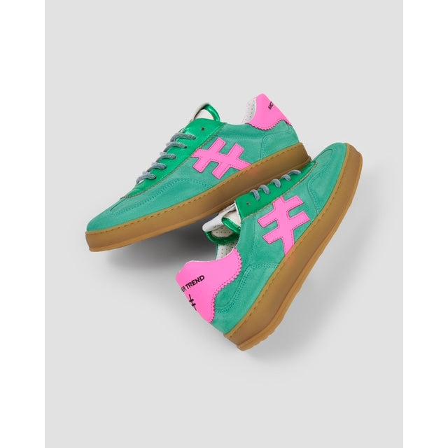 Green and pink suede lace-up trainers with gum soles, stylish and trendy baby girls' sneakers.