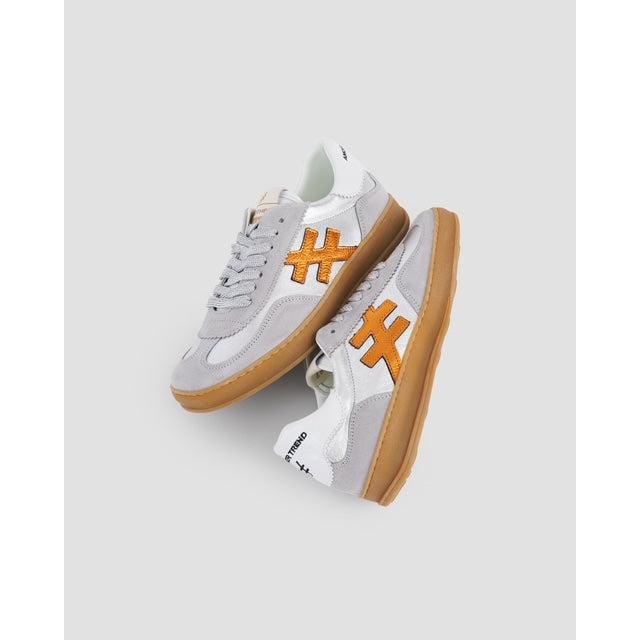 Women's grey leather lace-up trainers with orange logo details and gum soles.