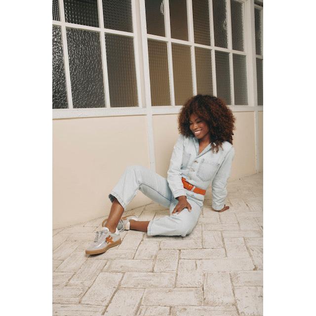 Women wearing Spanish Dove Grey Leather Lace-Up Trainers, stylish casual footwear with modern design.