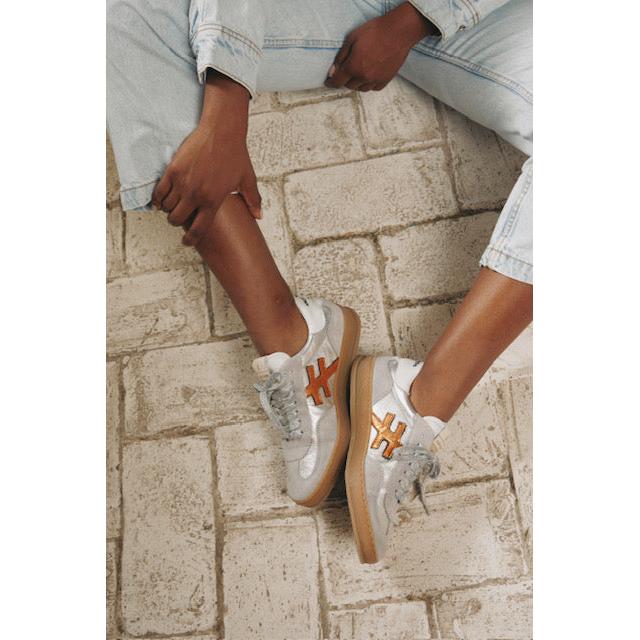 Women's Spanish Dove Grey Leather Lace-Up Trainers with orange detailing and gum soles, stylish and comfortable footwear.