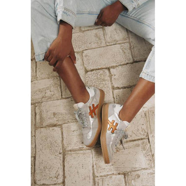 Women's Spanish Dove Grey Leather Lace-Up Trainers with orange detailing and gum soles, stylish and comfortable footwear.