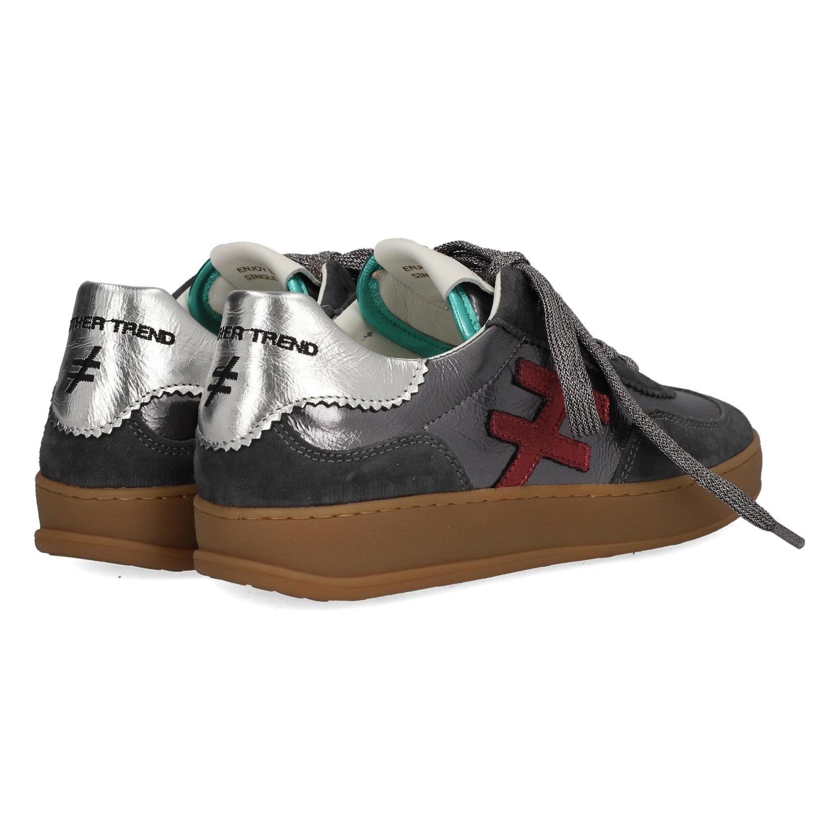 Stylish women's sneakers with anthracite suede, metallic leather accents, lace-up design, and tan rubber soles.