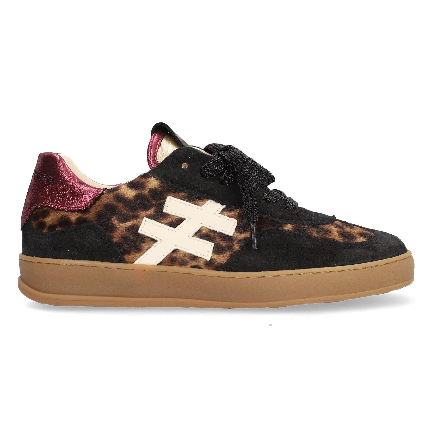 Women's black and leopard suede and leather lace-up trainers with white logo and beige sole.