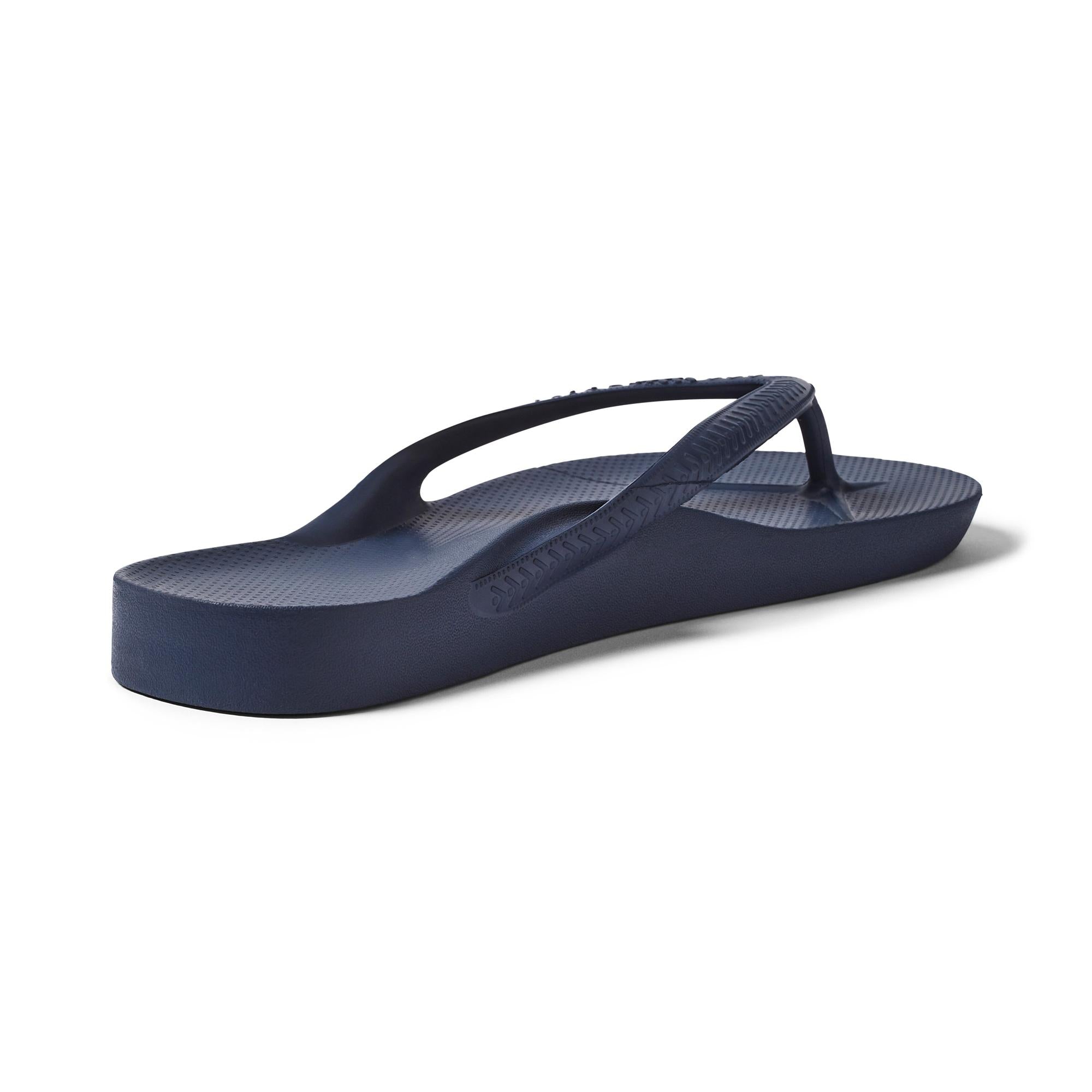 Archies Fit Flops classic navy unisex waterproof arch support slide sandals shown from a side view.