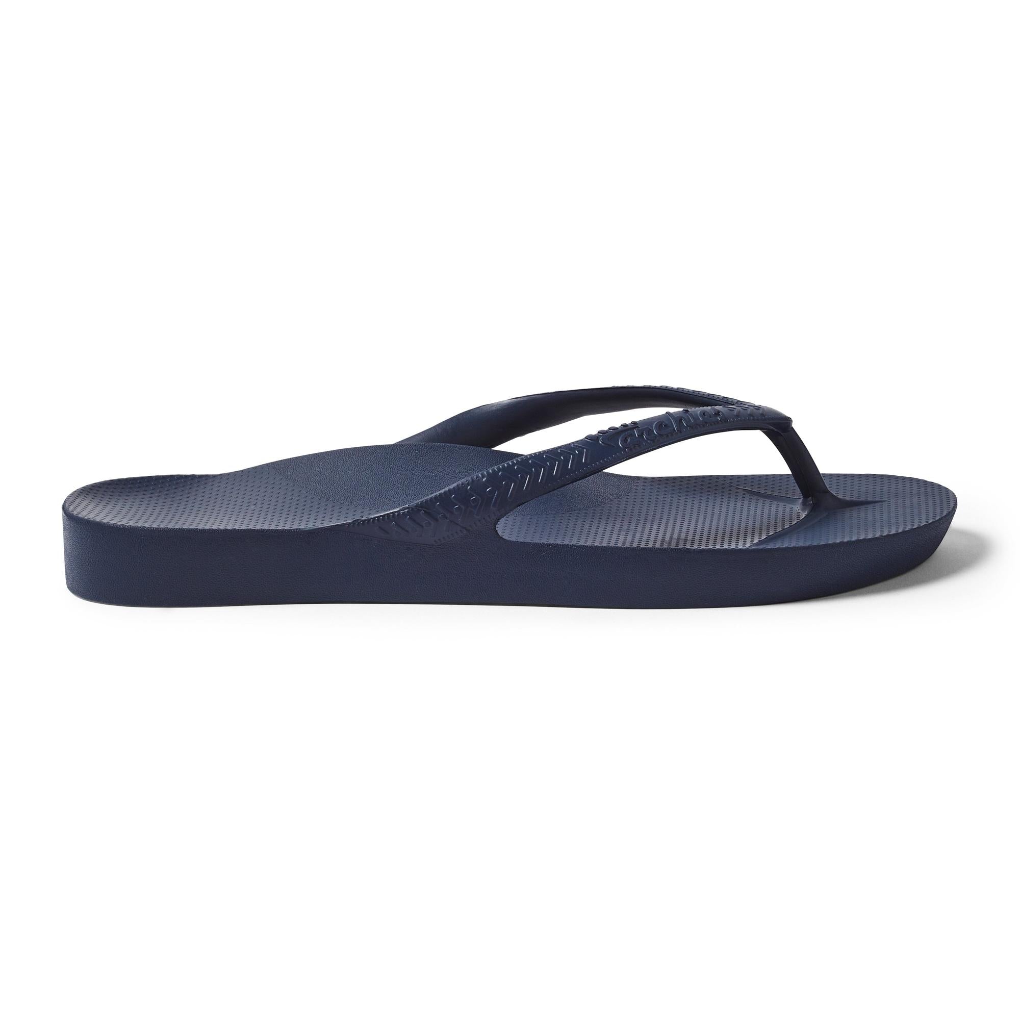 Navy waterproof Archies Fit Flops classic unisex slip-on sandals with arch support and textured footbed.