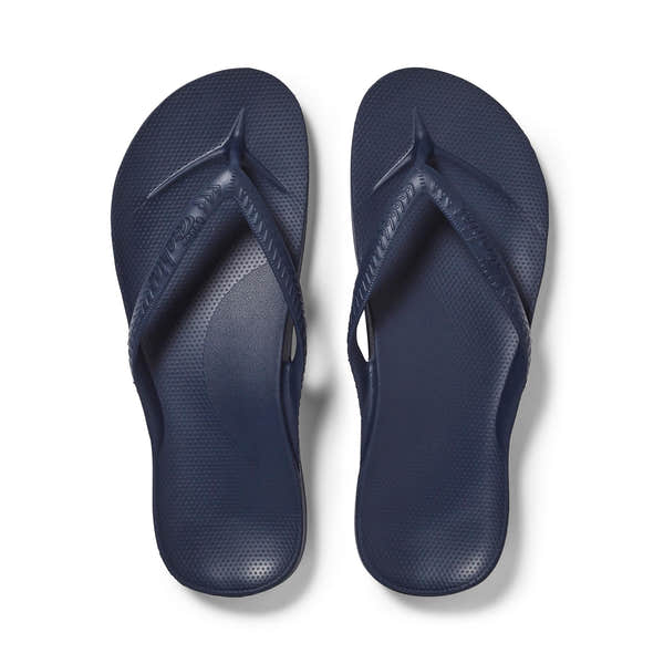 Unisex navy waterproof Archies Fit Flops slip-on sandals with arch support and textured footbed.