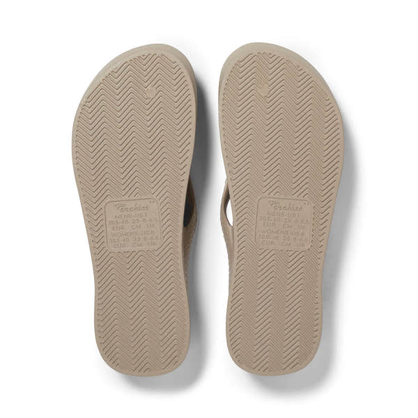 Archies Fit Flops Classic unisex taupe waterproof slip-on sandals with arch support and textured outsole.