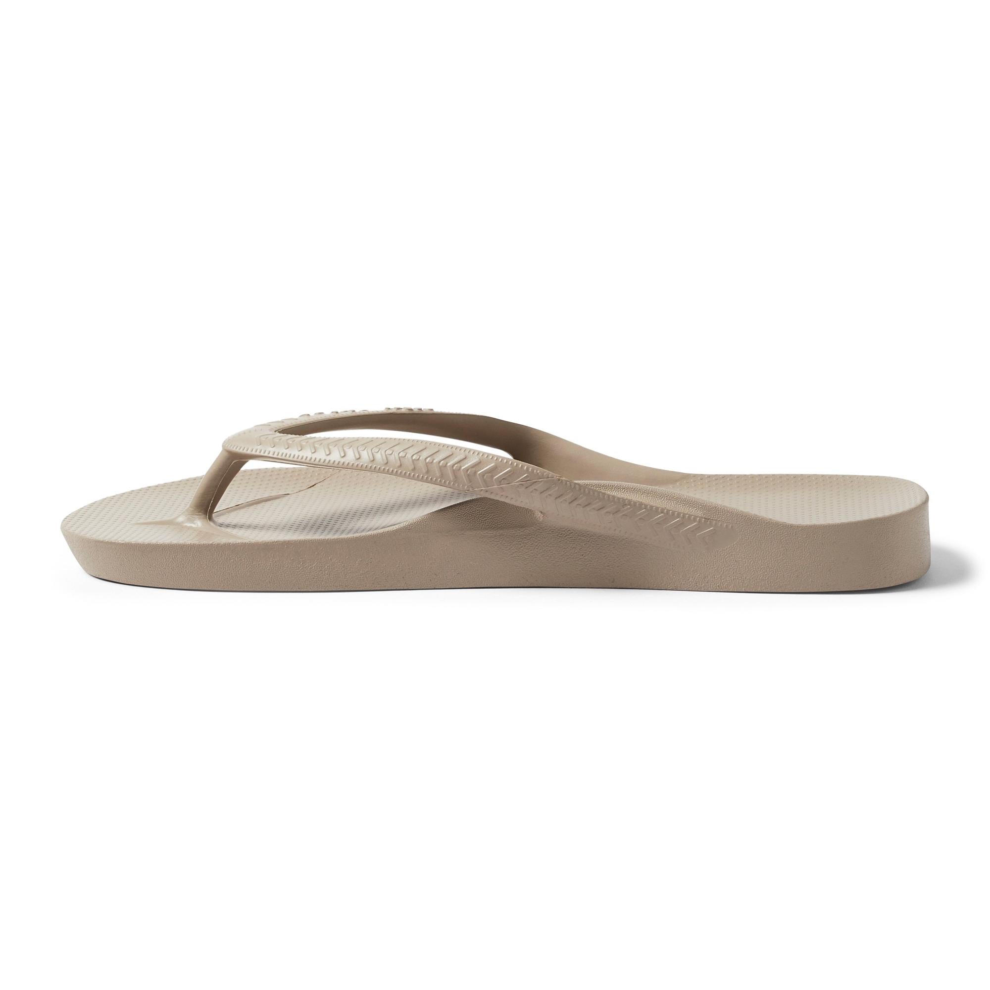 Archies Arch Support Fit Flops men's and women's taupe waterproof slip-on sandals with arch support and textured straps.