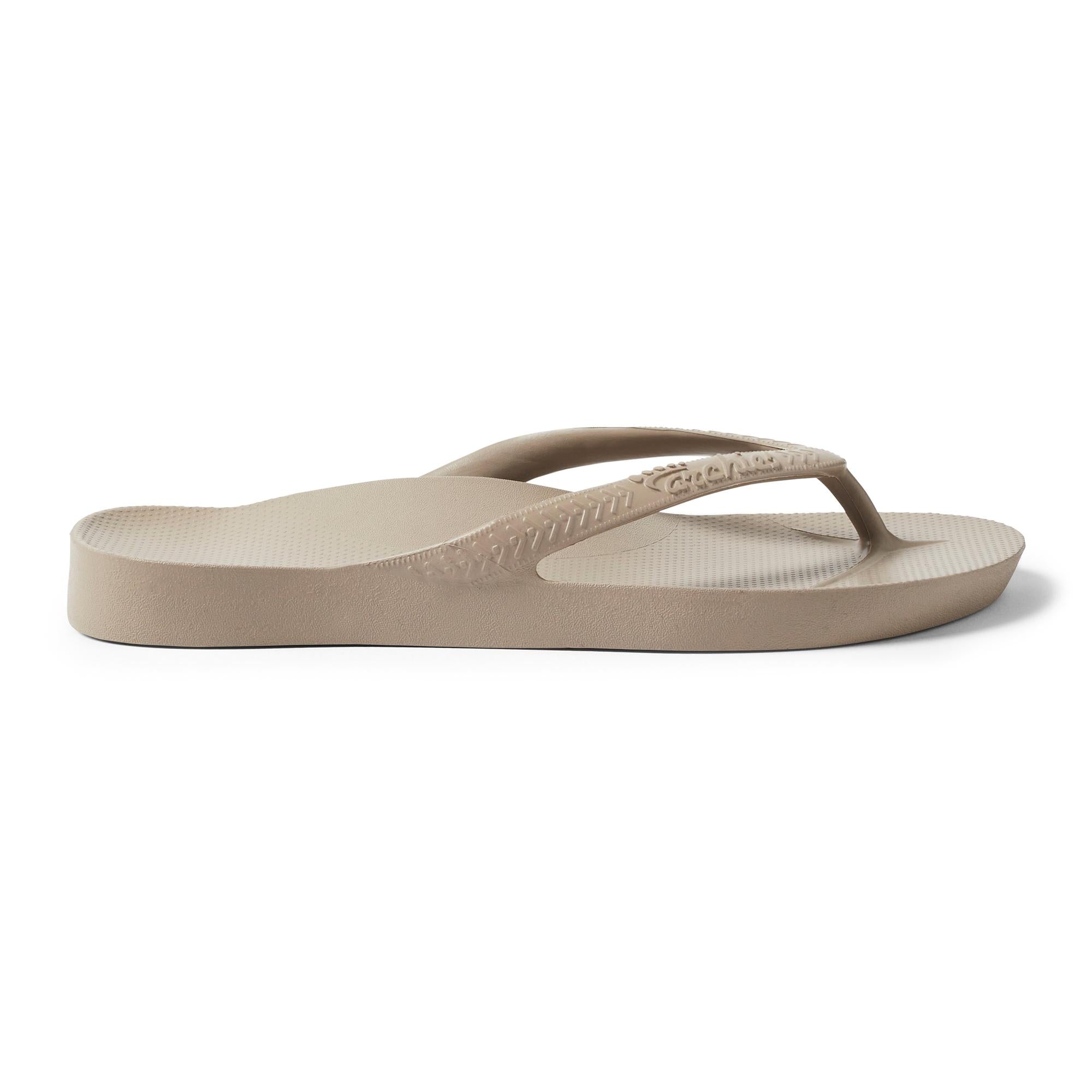 Unisex Taupe waterproof Archies Fit Flops classic slip-on sandals with arch support and textured footbed.