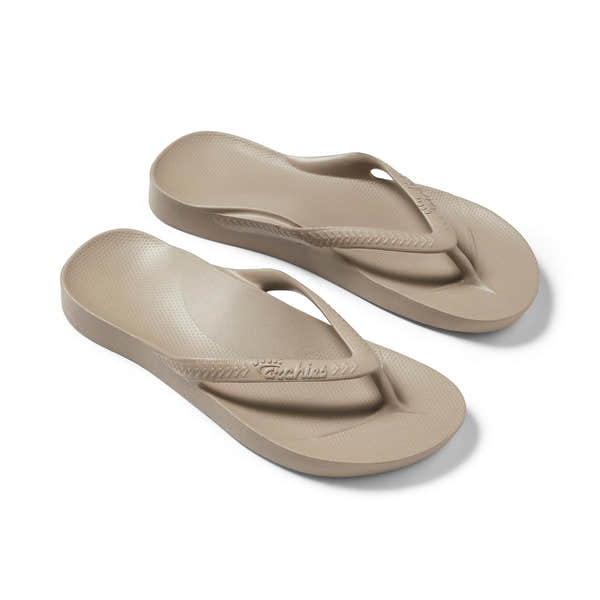 Unisex taupe waterproof Archies Fit Flops slip-on sandals with arch support and textured footbed.