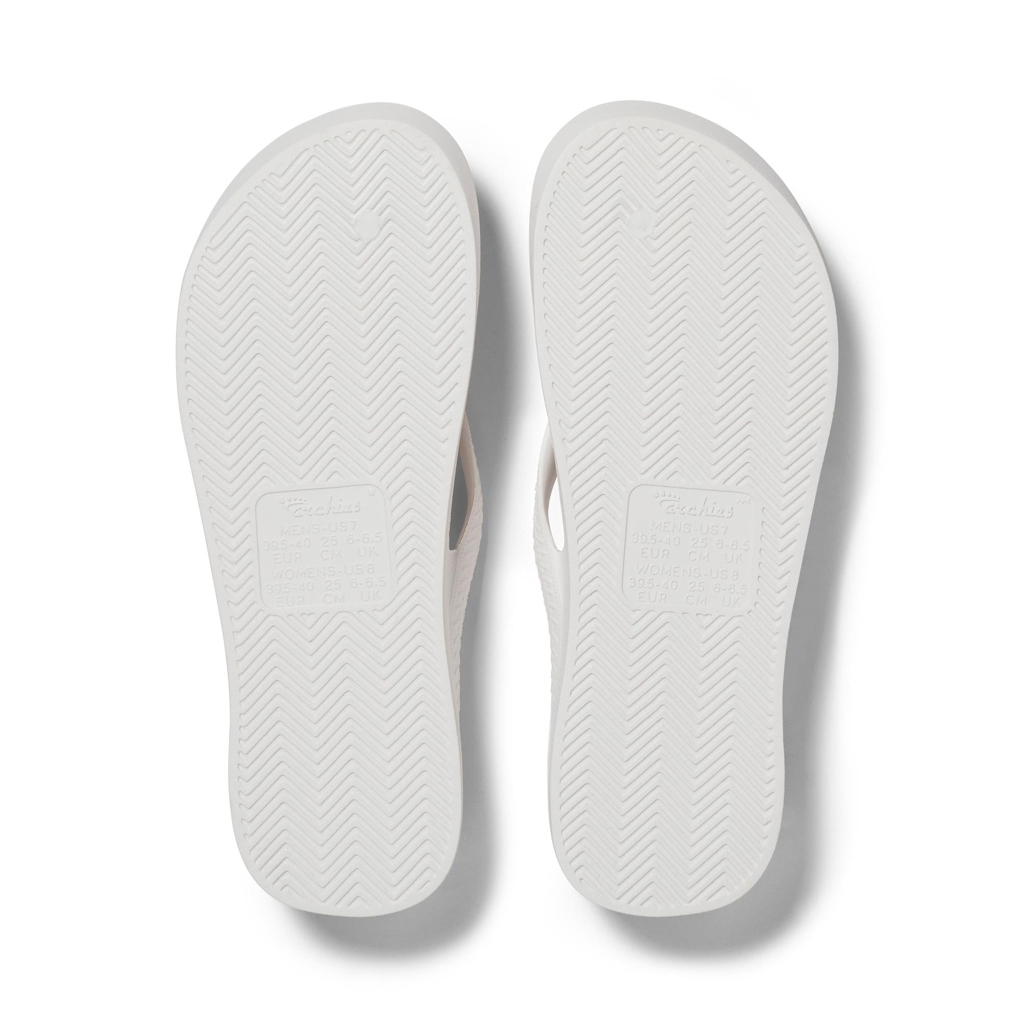 White waterproof unisex Archies Fit Flops classic slip-on sandals with arch support, ideal for casual wear.