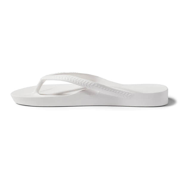 White waterproof unisex Archies Fit Flops classic slip-on sandals with arch support and rubber sole.
