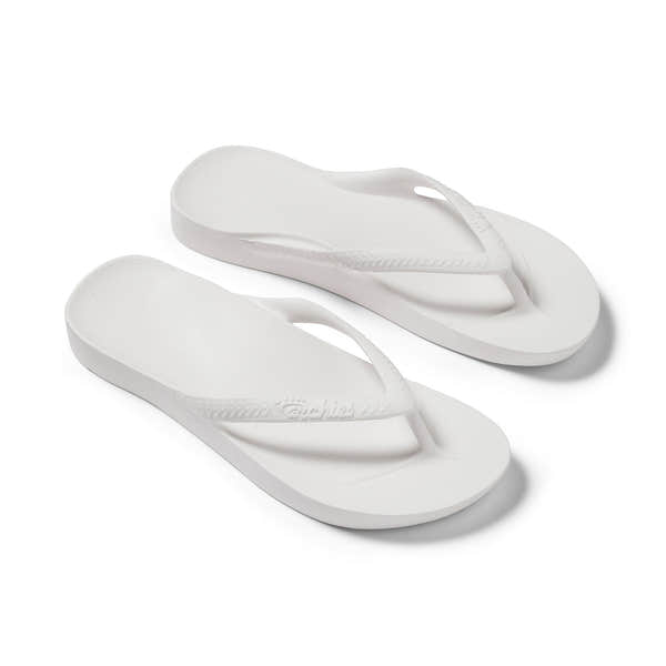 White waterproof unisex Archies Fit Flops with arch support and slip-on design, perfect for casual summer wear.