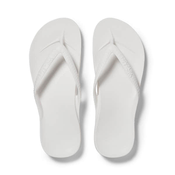White waterproof unisex Archies Fit Flops slip-on sandals with arch support and comfort.