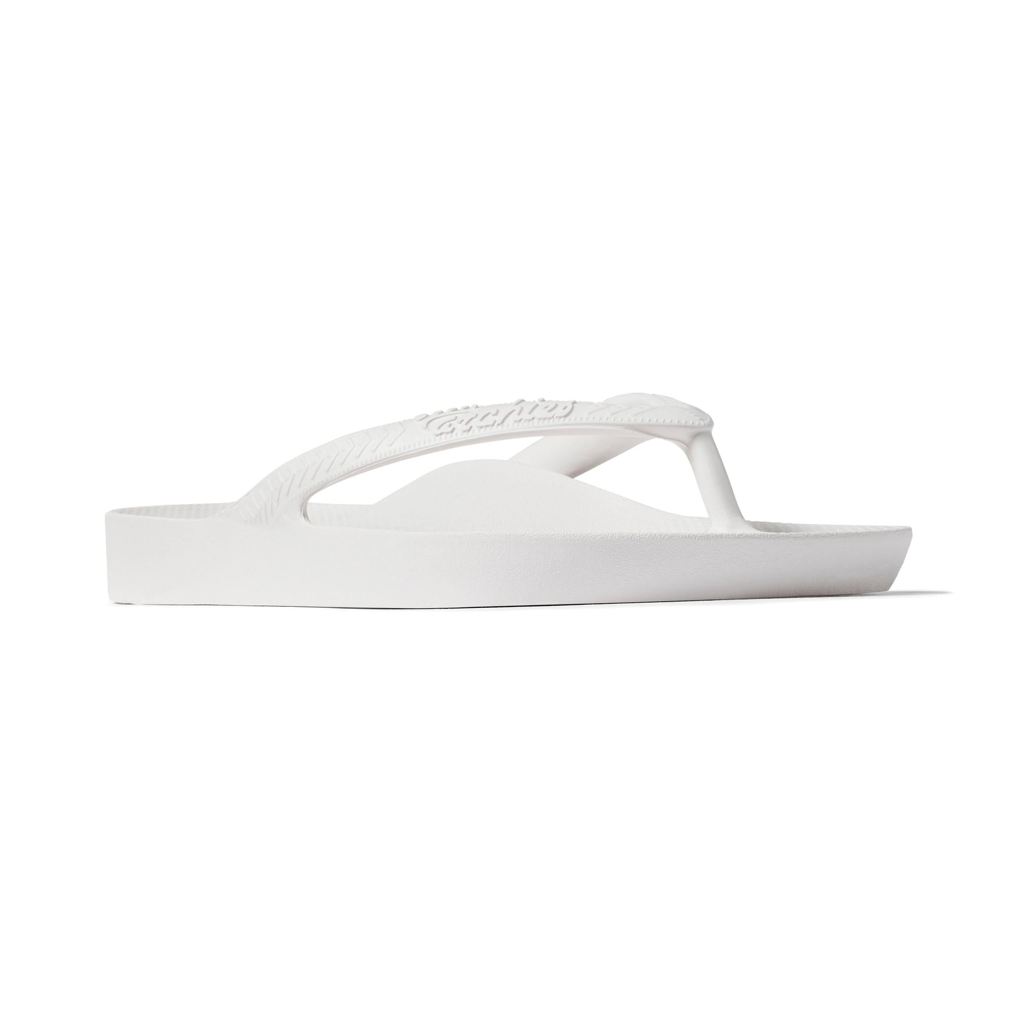 White waterproof unisex slip-on flip flops with arch support, from Archie’s Fit Flops Classic collection.