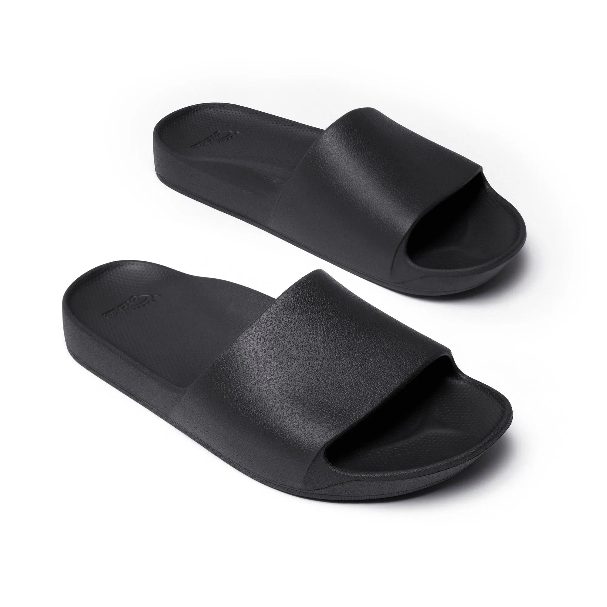 Black waterproof unisex arch support slide sandals with textured strap and cushioned footbed.