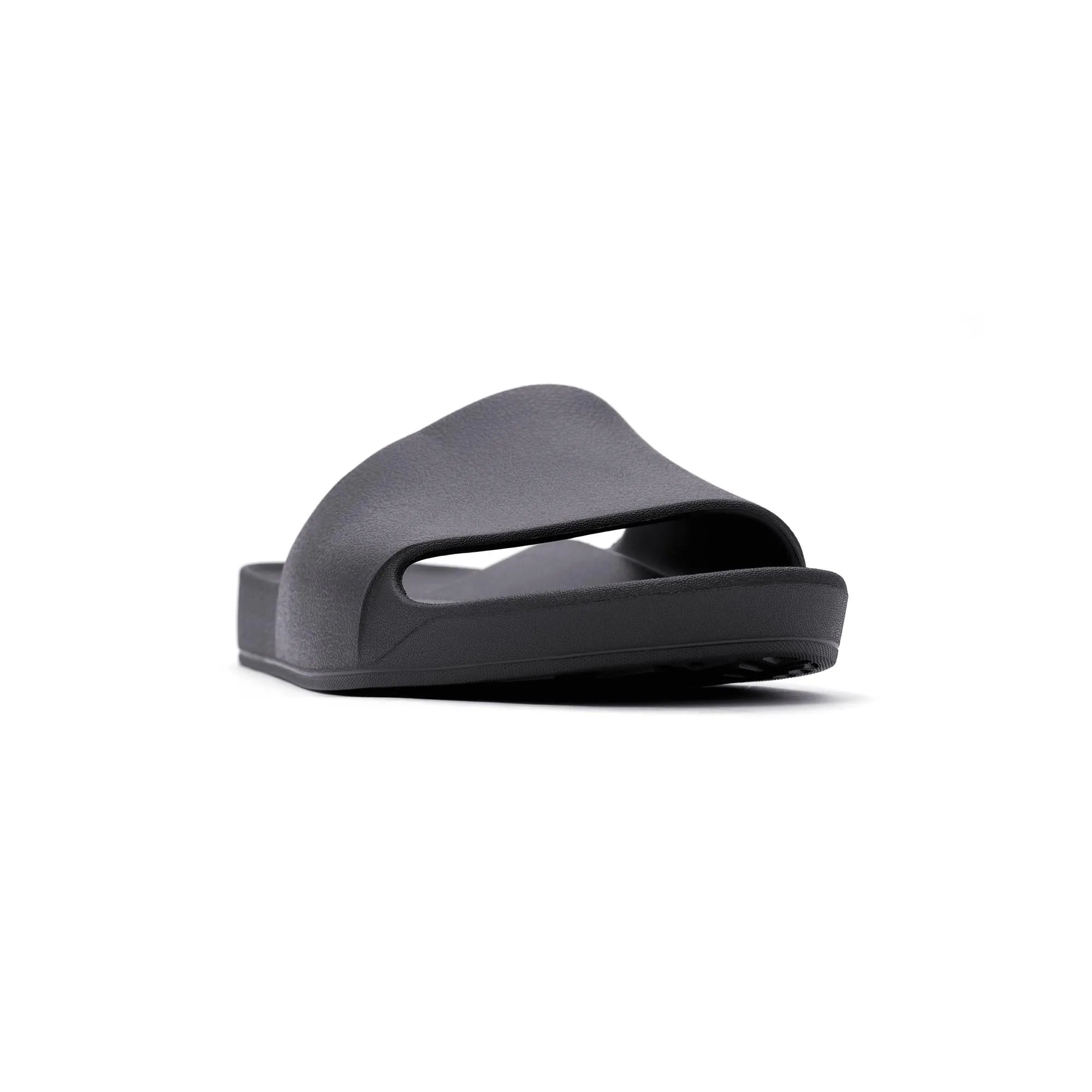 Black waterproof Archies unisex slide sandal with arch support and open toe design.