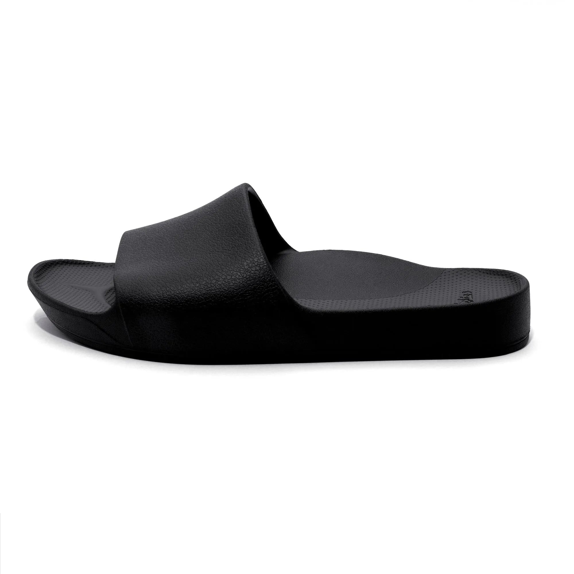 Black waterproof unisex arch support slide sandal with textured footbed and wide strap.