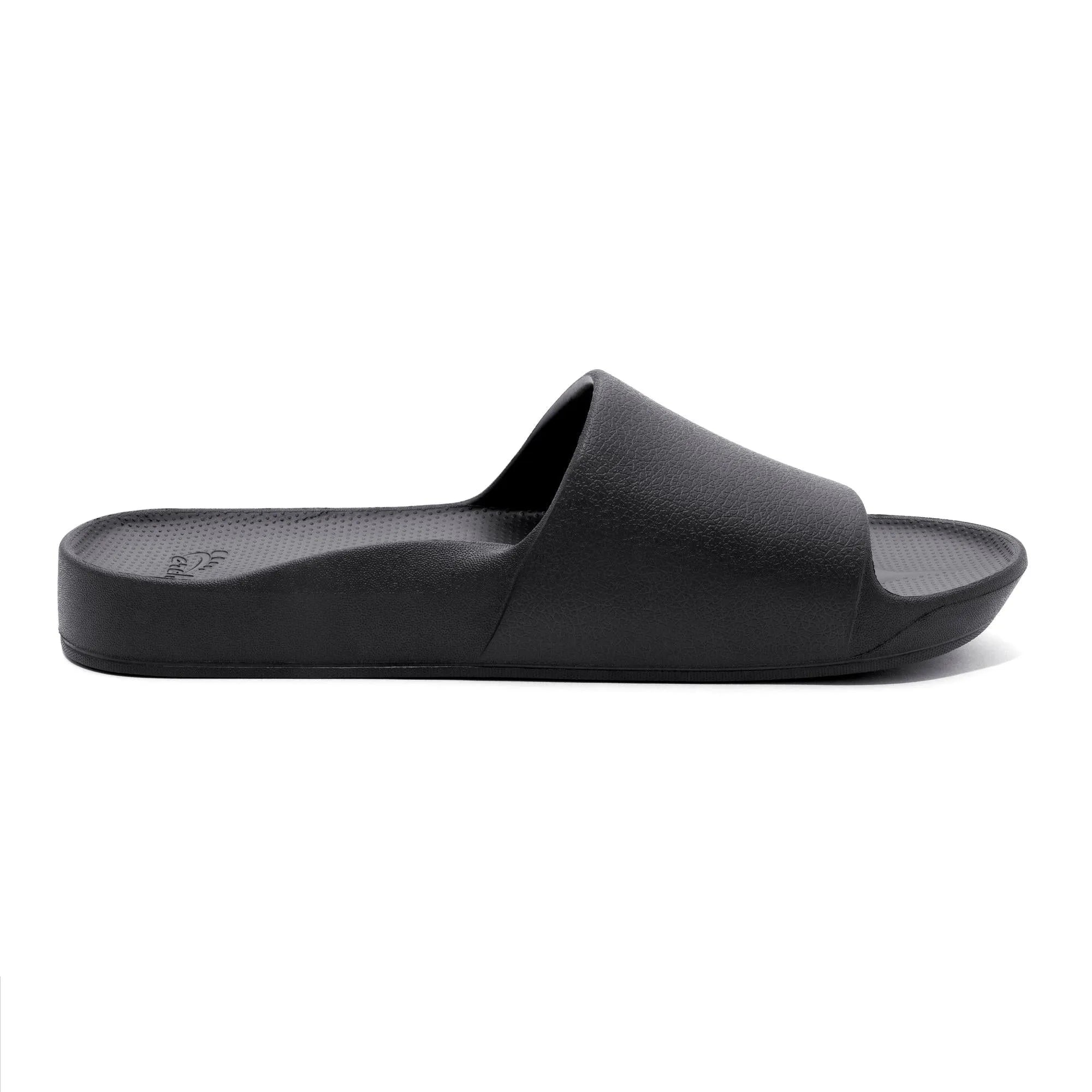 Unisex black waterproof Archies arch support slide sandal with textured strap and cushioned footbed.