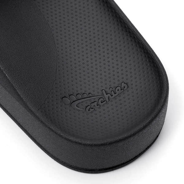 Black unisex waterproof Archies arch support slides, cushioned insole, matte finish, slip-on sandal for comfortable wear.