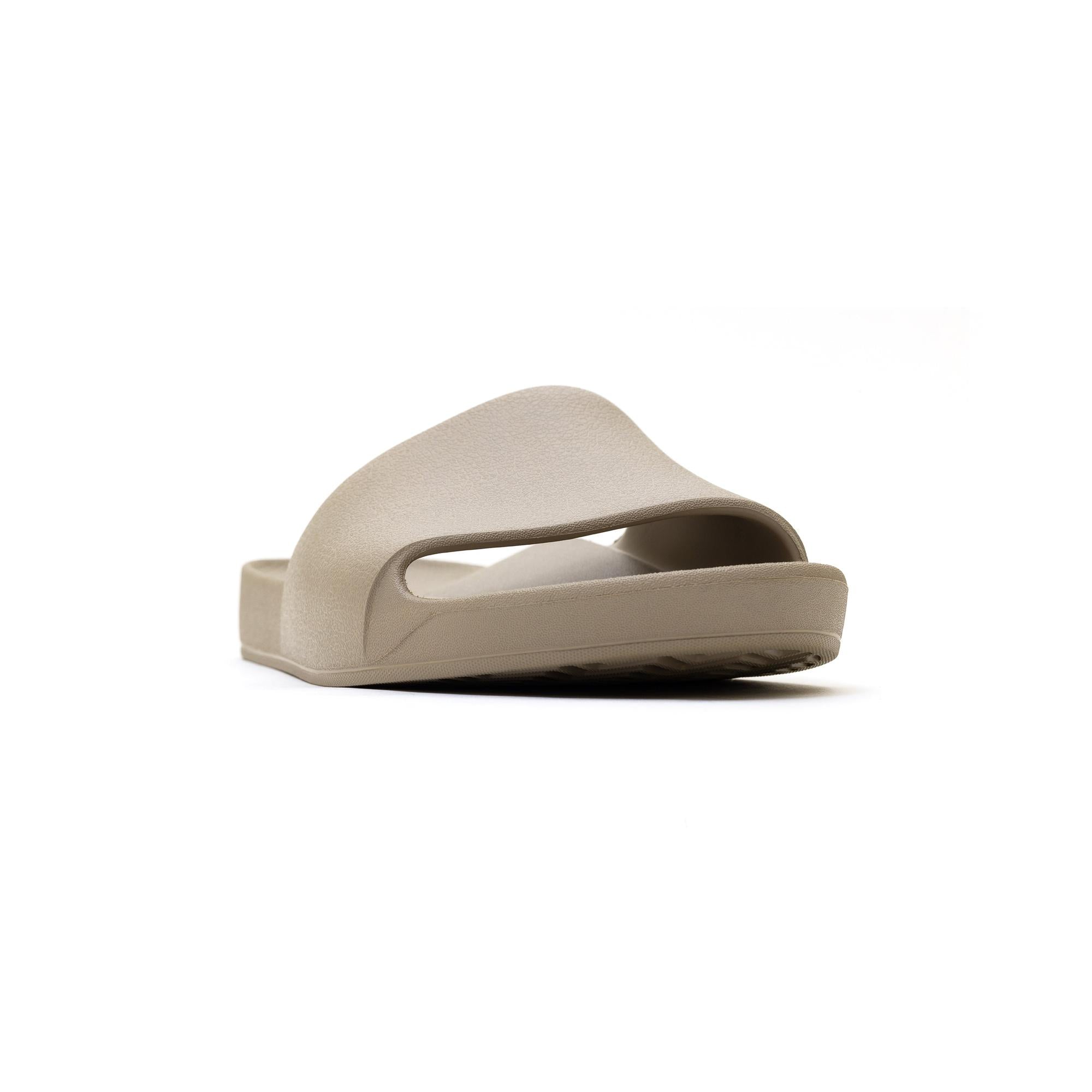 Unisex taupe waterproof arch support slide sandal with cushioned footbed and open toe design.