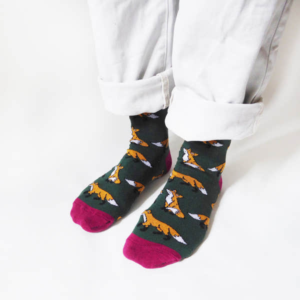 Barekind Save The Foxes bamboo socks with fox pattern, dark green, pink toes, eco-friendly footwear accessory.