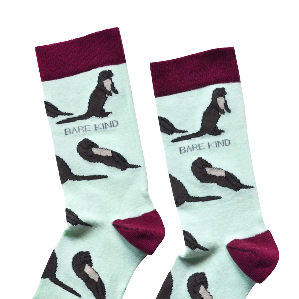 Barekind Save The Otters Bamboo Socks with otter design and maroon accents, eco-friendly material, unisex, comfortable fit.