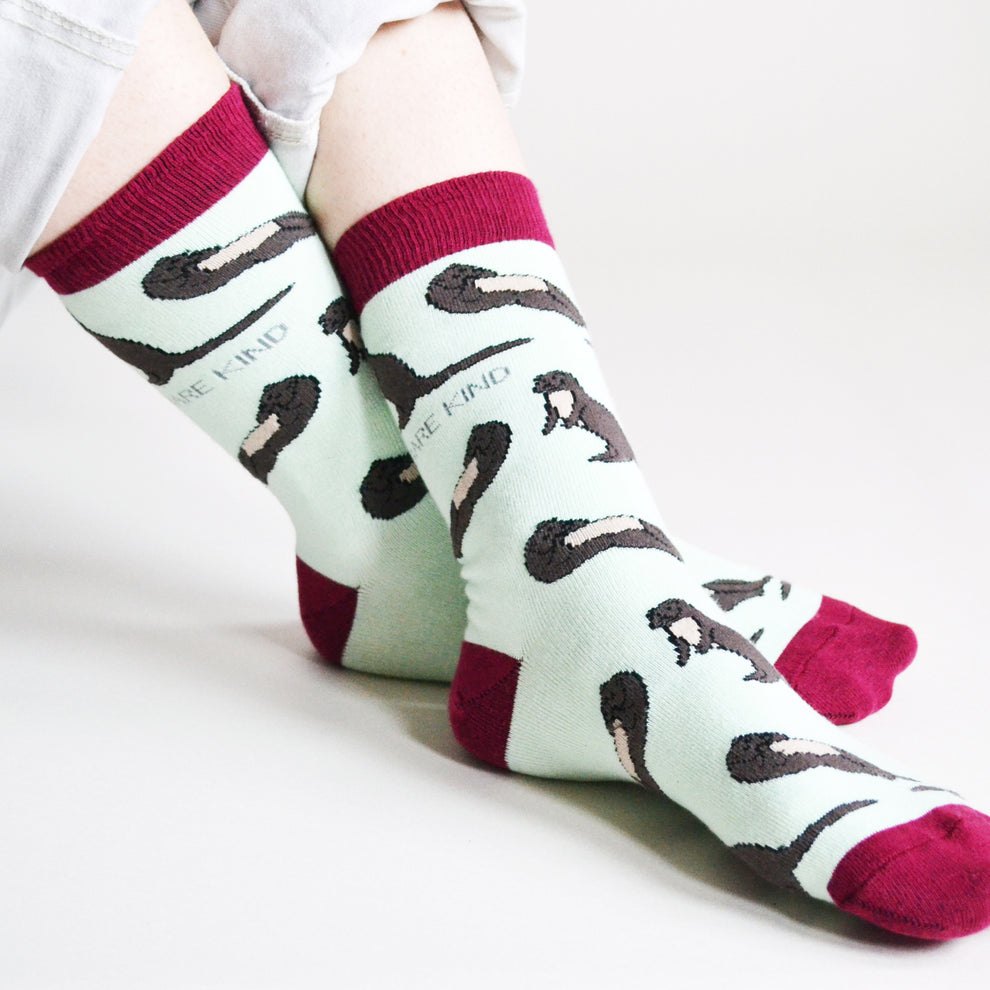 Barekind Save The Otters bamboo socks with otter print, maroon accents, and cushioned toe and heel, eco-friendly and sustainable.