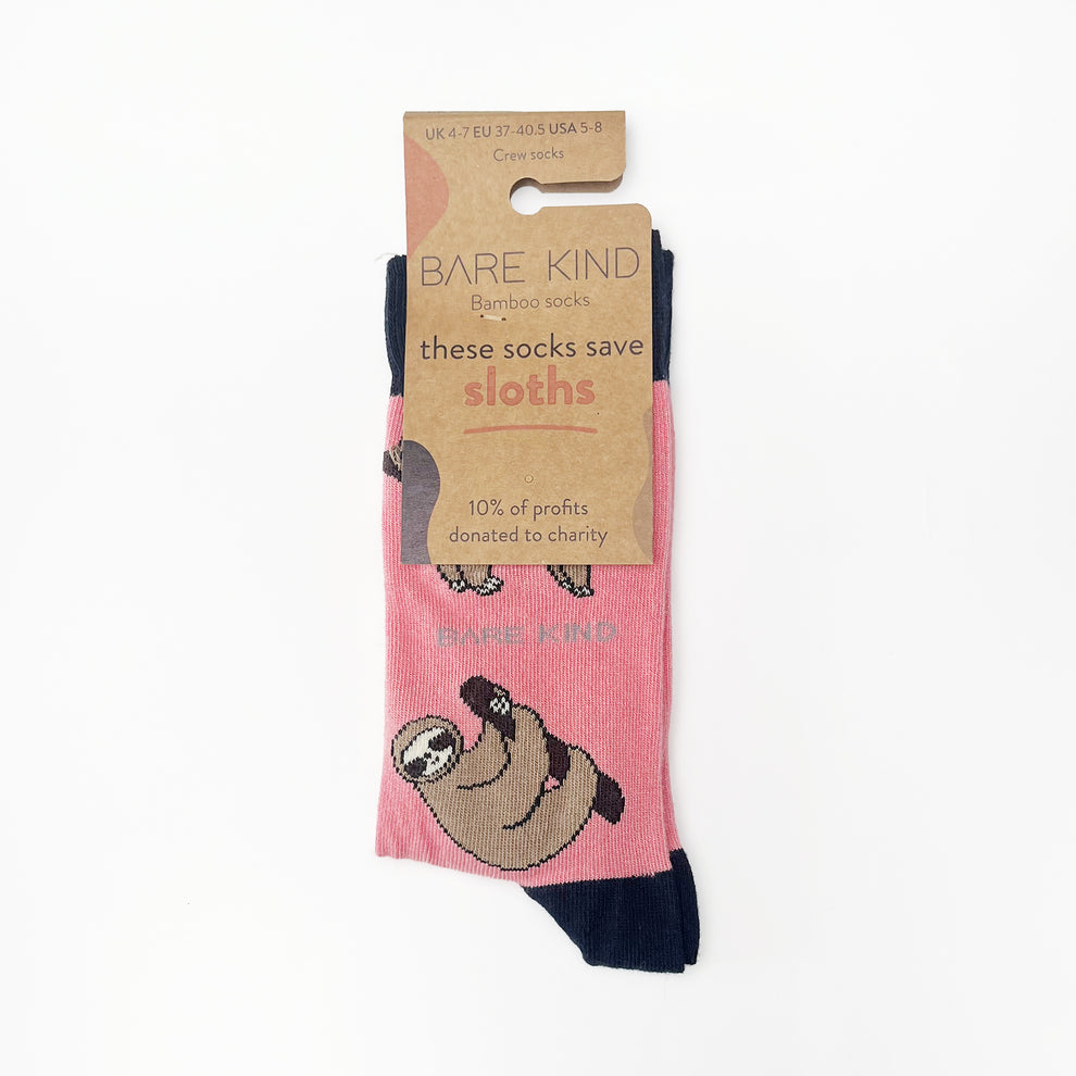 Barekind Save The Sloths bamboo socks with sloth illustration, pink and black design, made from eco-friendly bamboo, supports charity.