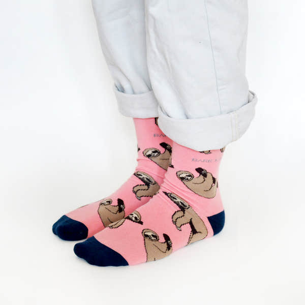 Barekind Save The Sloths bamboo socks with sloth prints, pink color, and navy toe and heel, eco-friendly and sustainable footwear.