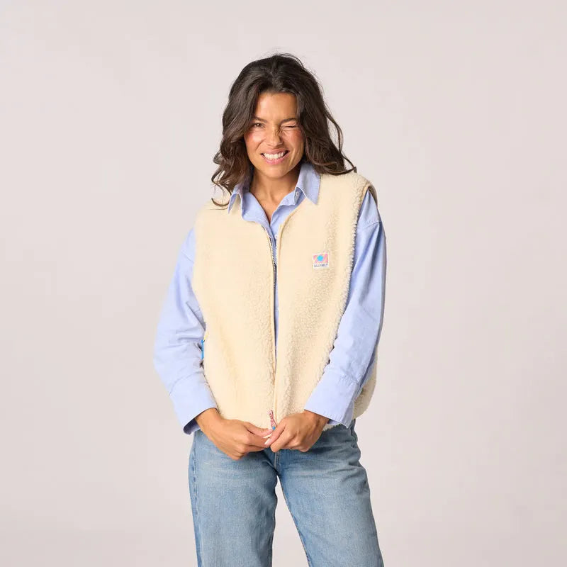 Billy Belt women's sleeveless ivory sherpa zip-up jacket, cozy and stylish outerwear for fall and winter.