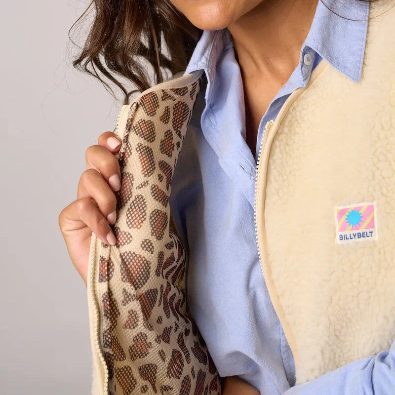 Billy Belt women's sleeveless ivory sherpa zip jacket with leopard-print lining, casual winter outerwear.