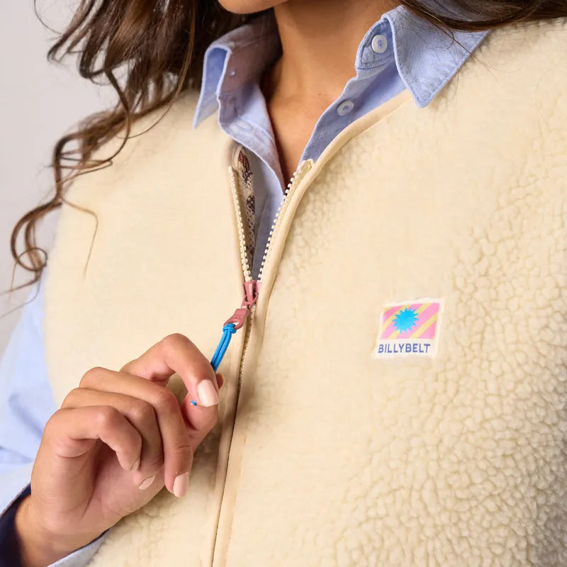 Billy Belt Ladies Sleeveless Ivory Sherpa Zip Jacket, soft fleece vest with colorful logo, high collar, and front zipper.