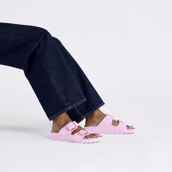 Women's pink Birkenstock Arizona Big Buckle EVA sandals with arch support, narrow fit, and buckle detail.
