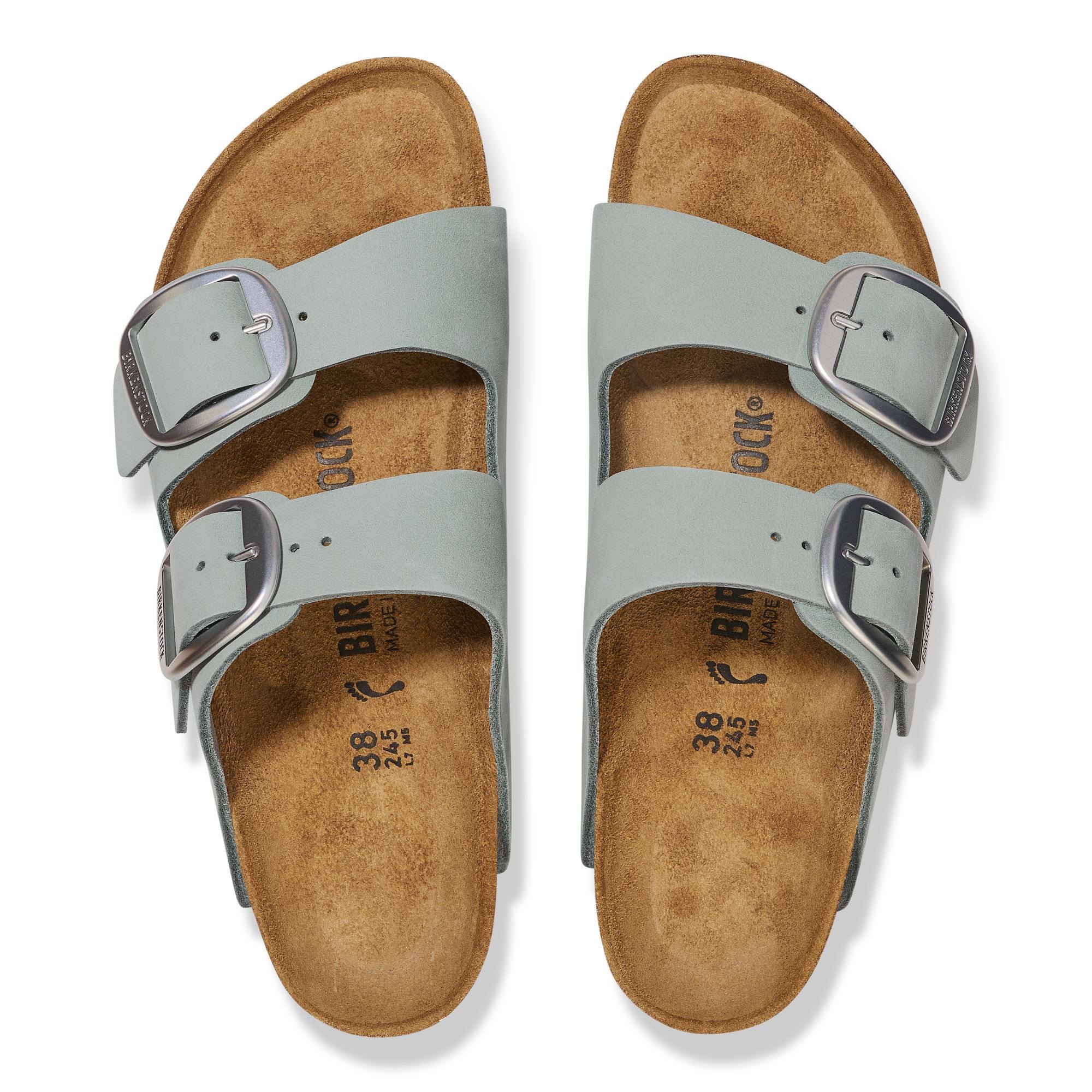 Women's Birkenstock Arizona Big Buckle narrow nubuck sandals with arch support, sage color, double buckle straps, and cushioned footbed.