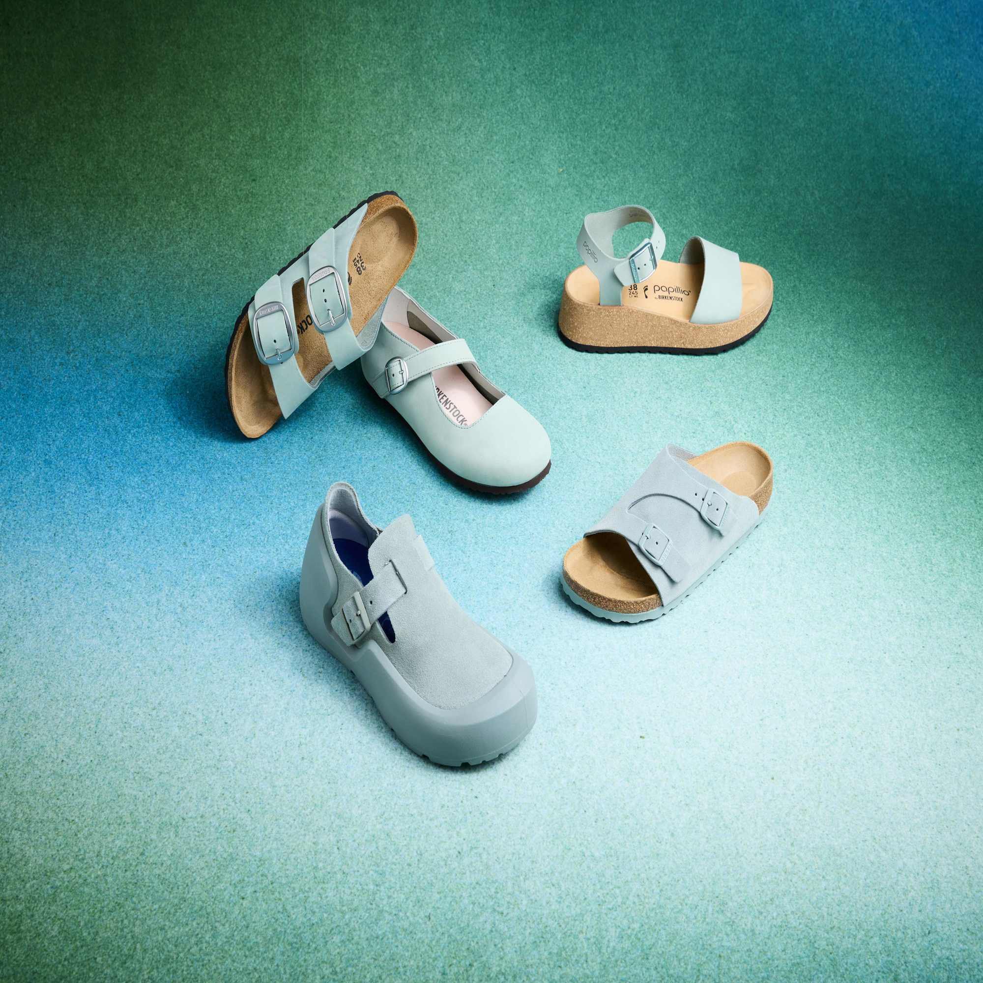 Birkenstock Arizona women's narrow sandals with pure sage nubuck straps, adjustable buckles, arch support, and cork footbed.