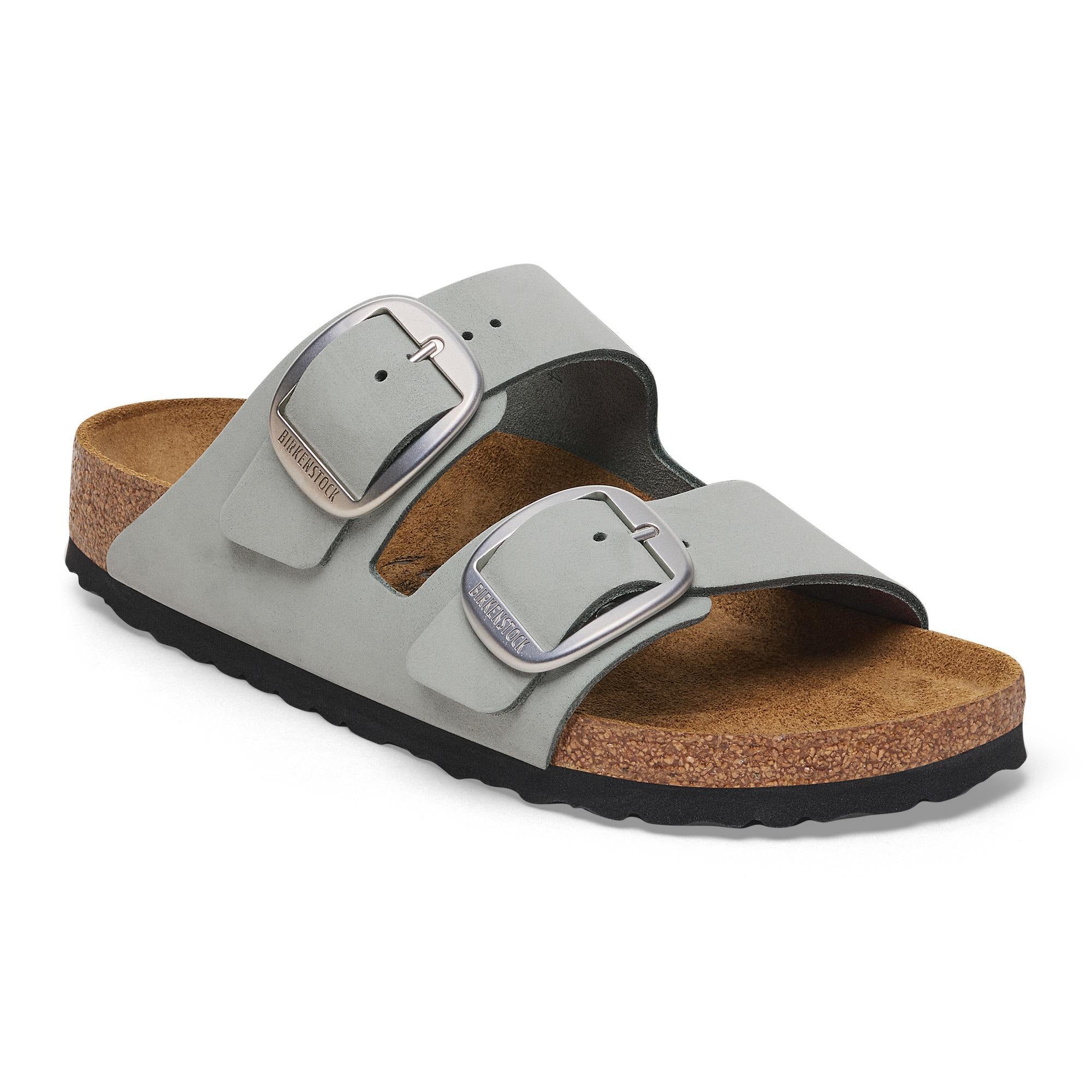 Birkenstock Arizona women’s narrow sandals with sage nubuck straps, big buckles, arch support, and cork footbed.