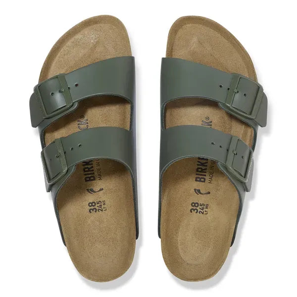 Birkenstock Arizona leather unisex sandals with buckle straps, in thyme color, featuring arch support and cork footbed.