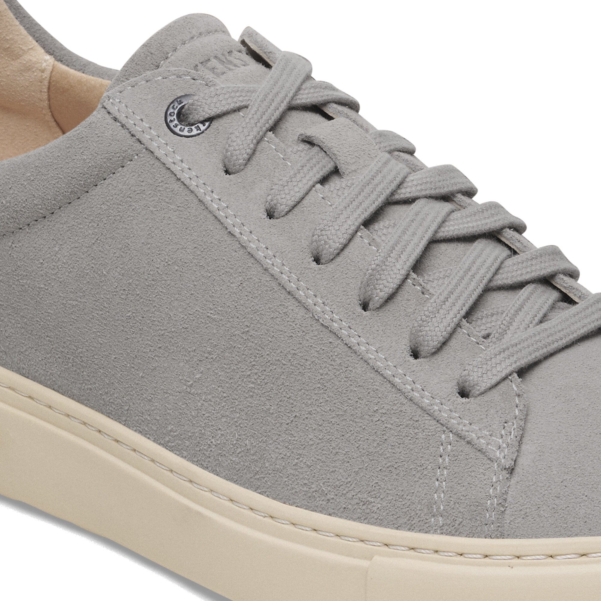 Birkenstock Bend Low Ladies Stone Coin Suede Lace-Up Trainers with arch support and beige sole.