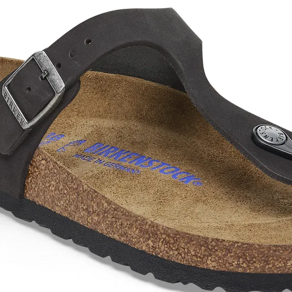 Birkenstock Gizeh women's black nubuck arch support buckle sandals with contoured cork footbed and adjustable strap.