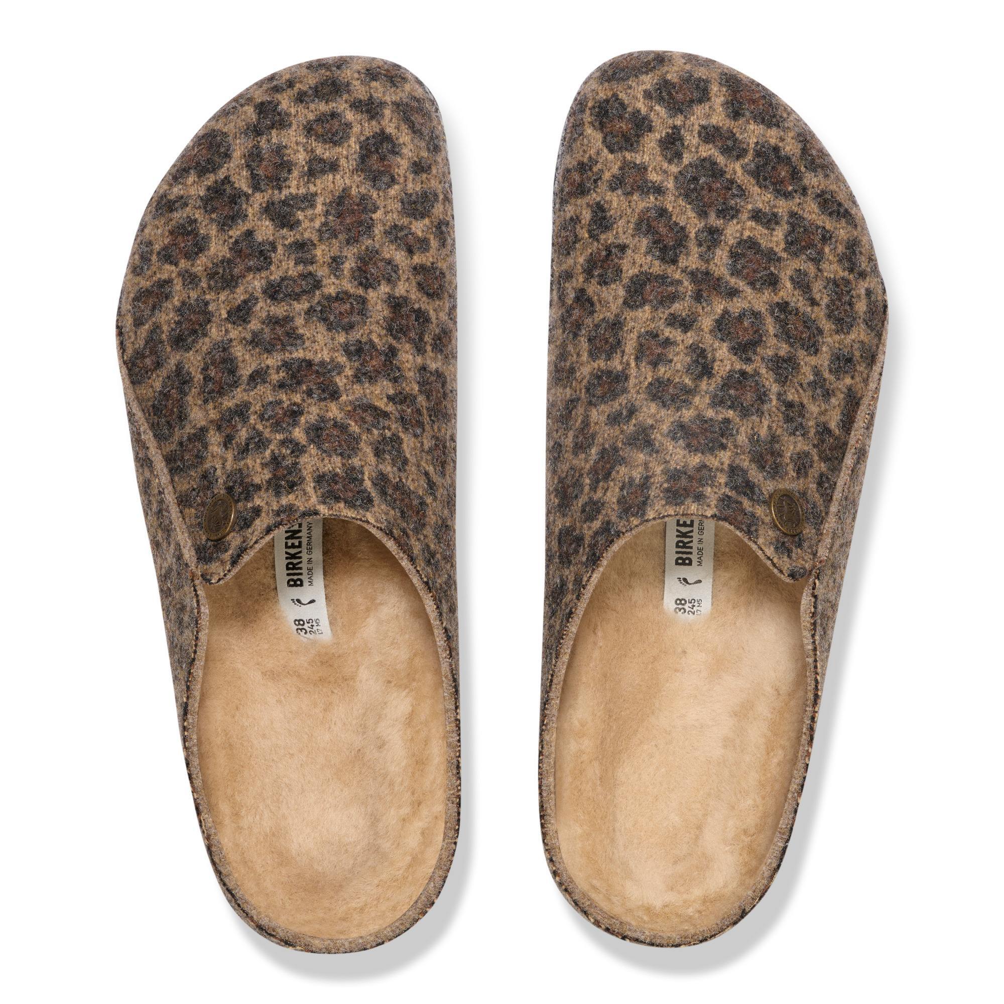 Women's Birkenstock Zermatt leopard shearling slip-on mule with textile upper and arch support.