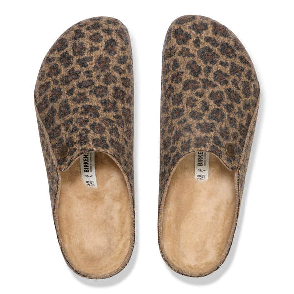 Women's Birkenstock Zermatt leopard shearling slip-on mule with textile upper and arch support.