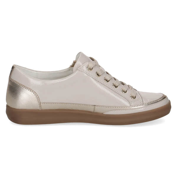 Ladies cream and gold leather lace-up sneaker with zip detail, low profile, and brown rubber sole.