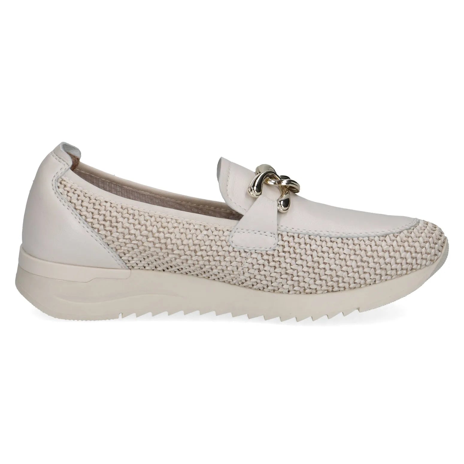Ladies off-white slip-on shoes with leather and textile upper, metal bow detail, and a sporty rubber sole.