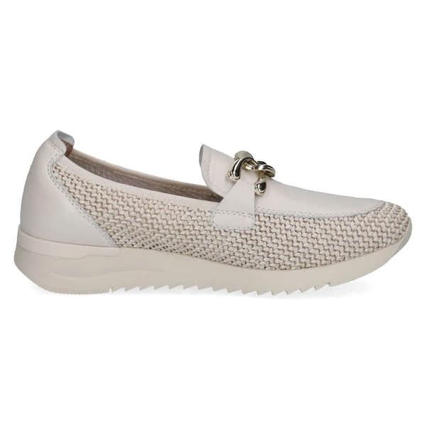 Ladies off-white slip-on shoes with leather and textile upper, metal bow detail, and a sporty rubber sole.