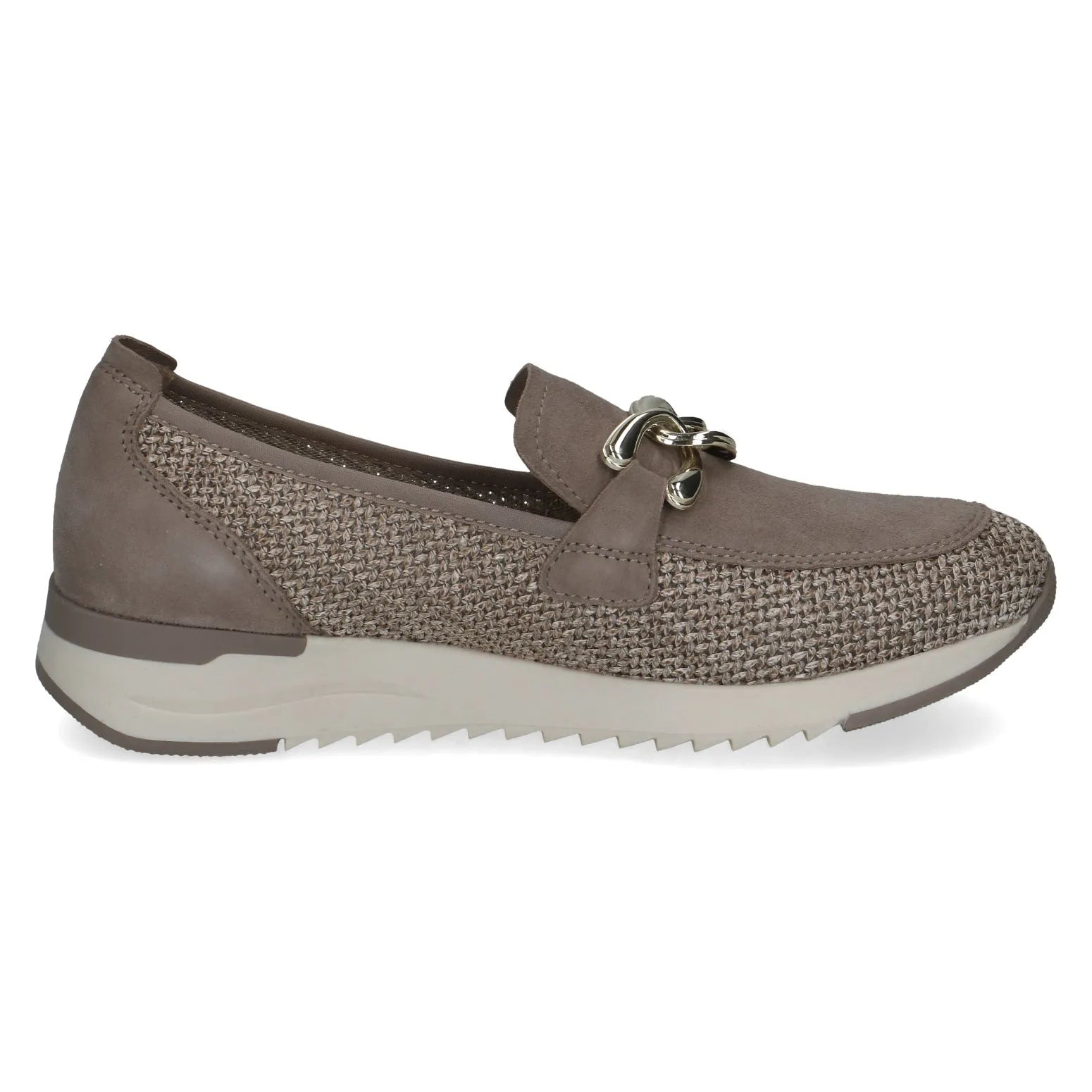 Ladies brown slip-on shoes with leather, textile upper, decorative metal detail, and rugged white and brown sole.