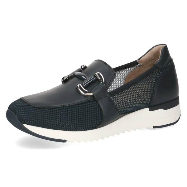 Ladies black leather and textile slip-on shoes with metal buckle details, mesh panels, and a white rubber sole.